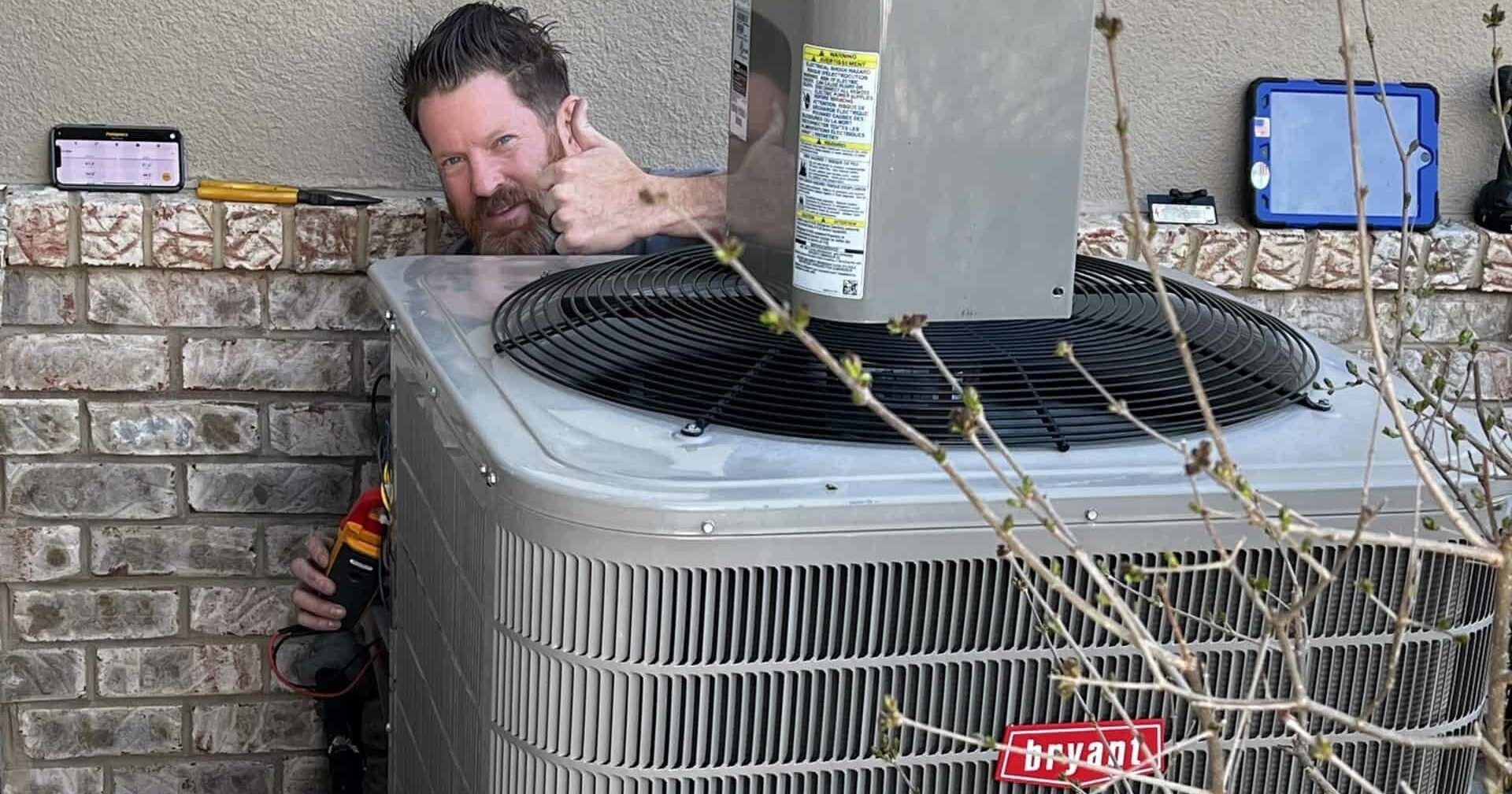 Austin Plumbing, Heating & Air Tech Repairing a Central AC